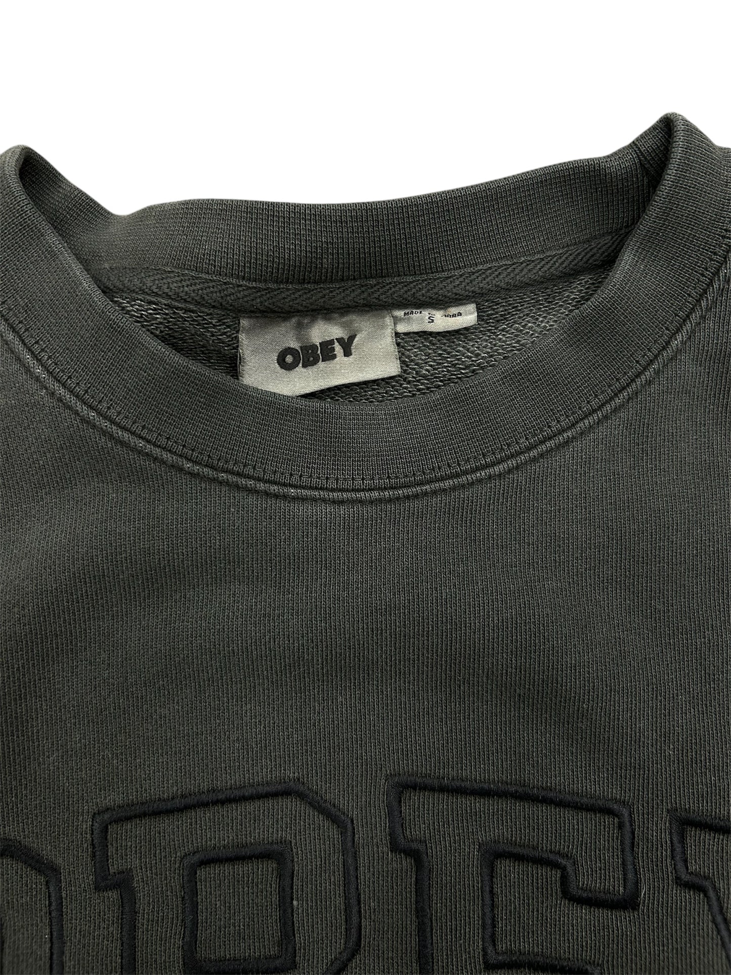 Felpa Obey paricollo